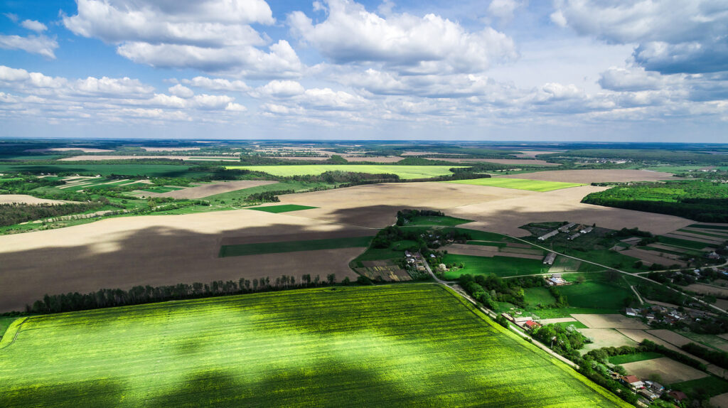 beautiful-landscape-with-shade-clouds-field-aerial-photo
